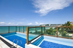 Na praia - Araça 206 Luxo - Lateral vista jardim